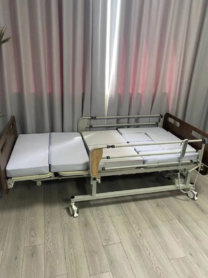 Logement électrique pour personnes âgées Lit de soins infirmiers avec roues verrouillables